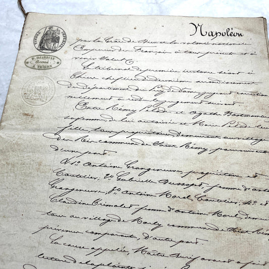 1800s French notarial act with handwritten text and imperial seals featuring a figure of justice and an eagle.