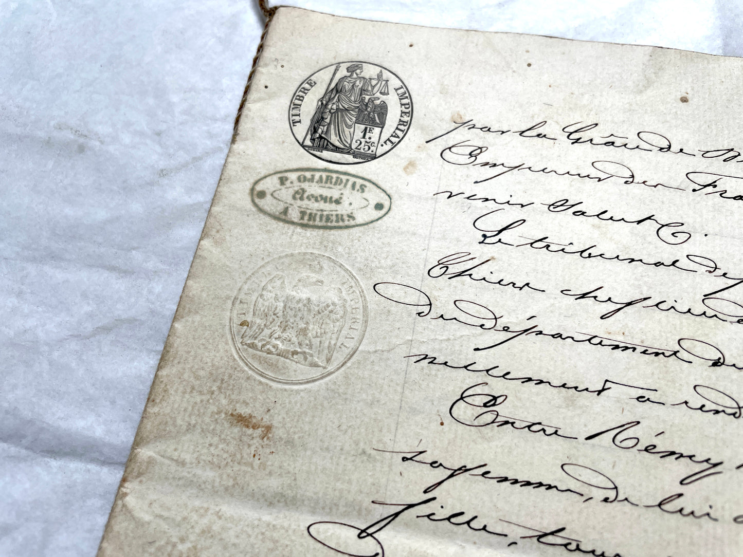 1800s French notarial act with handwritten text and imperial seals featuring a figure of justice and an eagle.