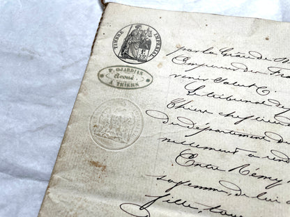1800s French notarial act with handwritten text and imperial seals featuring a figure of justice and an eagle.