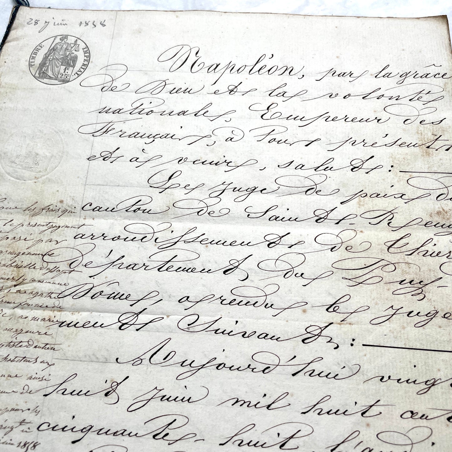 Mid 19th Century French notarial act, 1858, with elegant script and Imperial stamp featuring Justice figure.