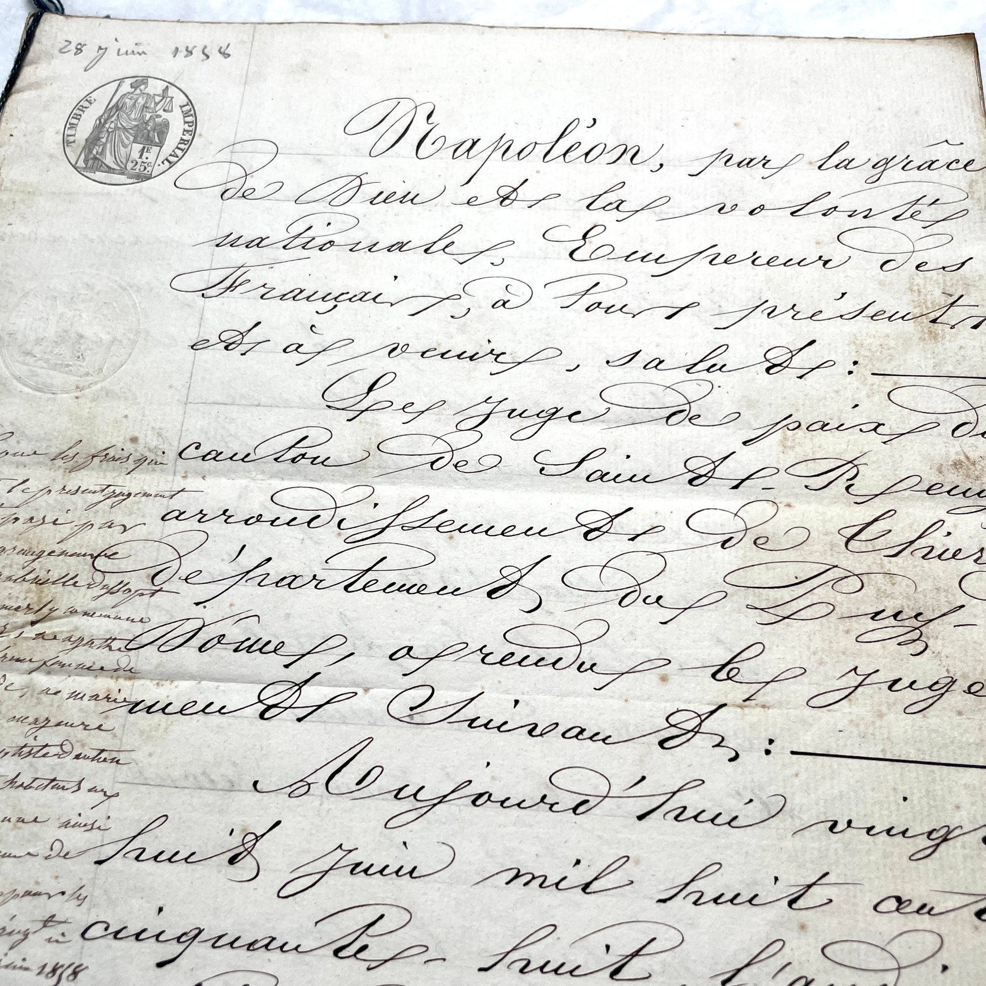 Mid 19th Century French notarial act, 1858, with elegant script and Imperial stamp featuring Justice figure.