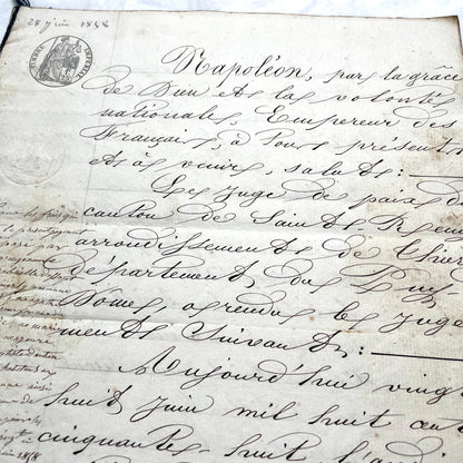 Mid 19th Century French notarial act, 1858, with elegant script and Imperial stamp featuring Justice figure.