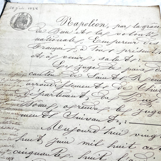 Mid 19th Century French notarial act, 1858, with elegant script and Imperial stamp featuring Justice figure.