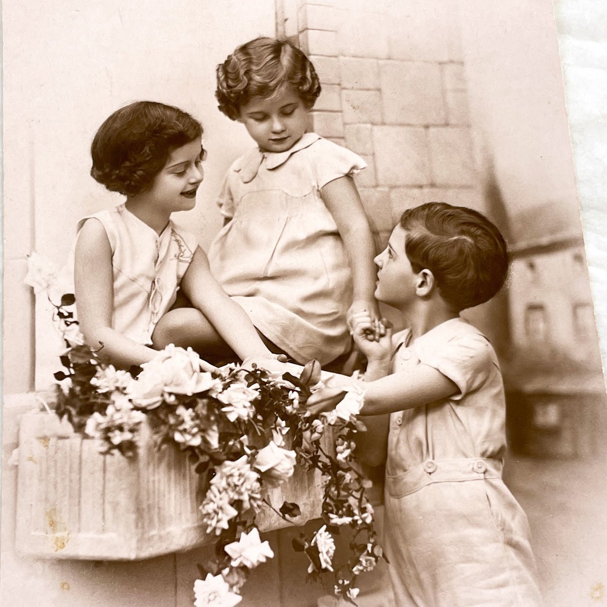 1920s - Charming Vintage Postcard - Three Children with Flowers - Sentimental Ephemera - Ste Barbe Dedication - Collectible Historical Piece