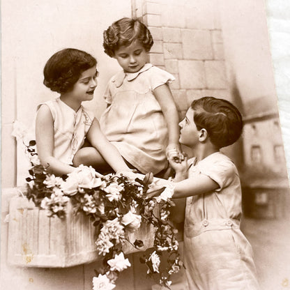1920s - Charming Vintage Postcard - Three Children with Flowers - Sentimental Ephemera - Ste Barbe Dedication - Collectible Historical Piece