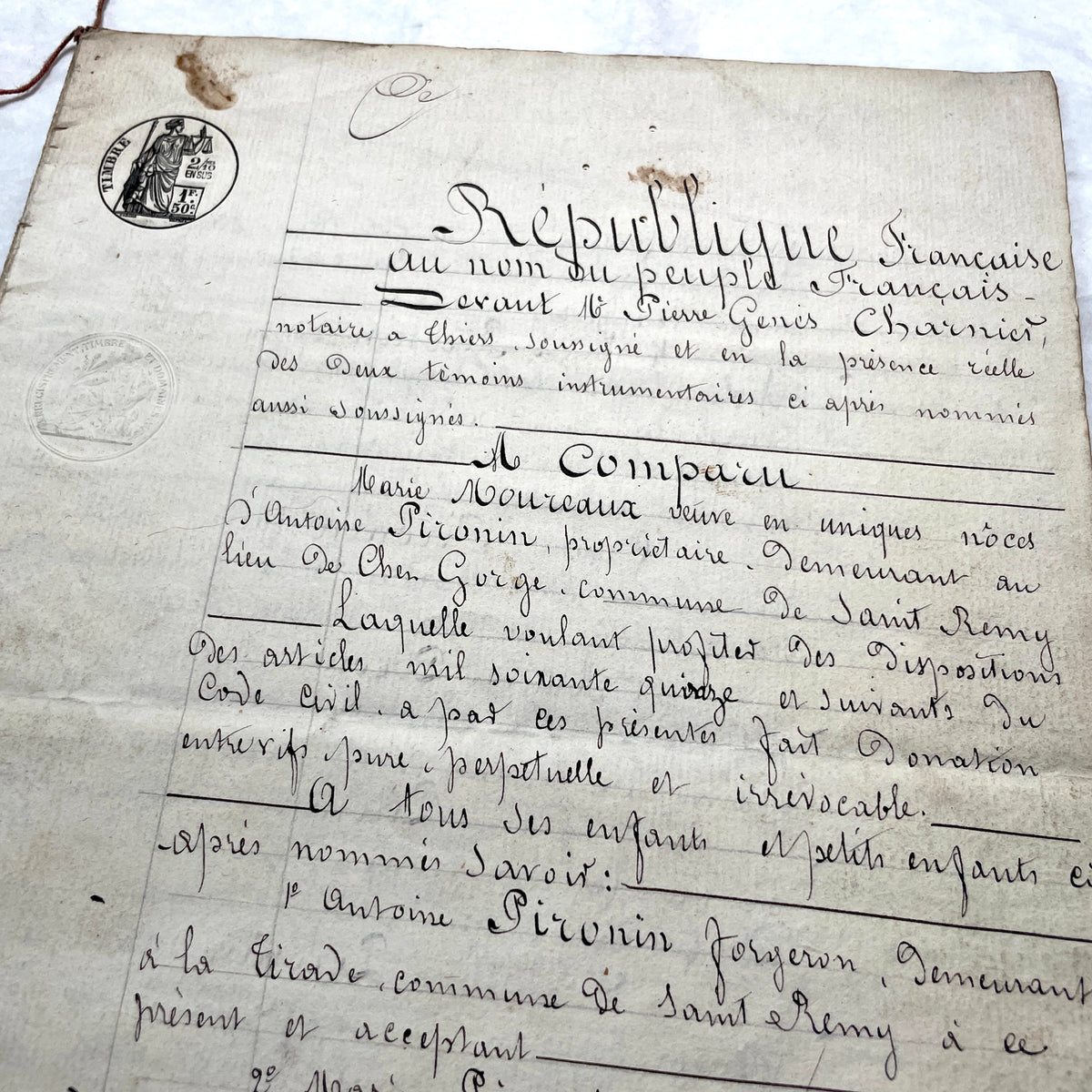 Late 19th Century French Notarial Act - Handwritten legal document with official stamps and elaborate script.