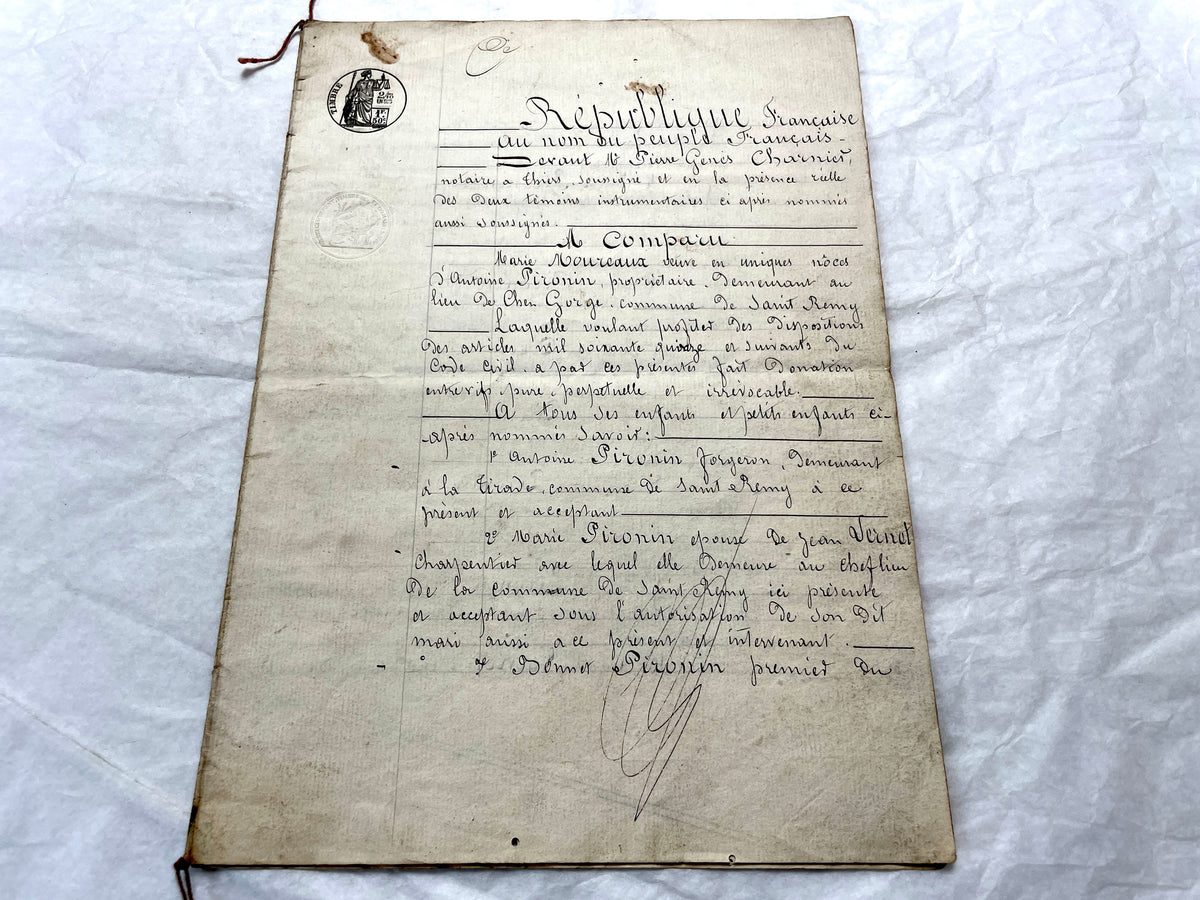 Late 19th Century French Notarial Act - Handwritten legal document with official stamps and elaborate script.