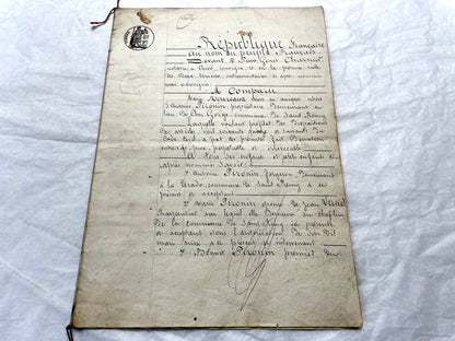 Late 19th Century French Notarial Act - Handwritten legal document with official stamps and elaborate script.
