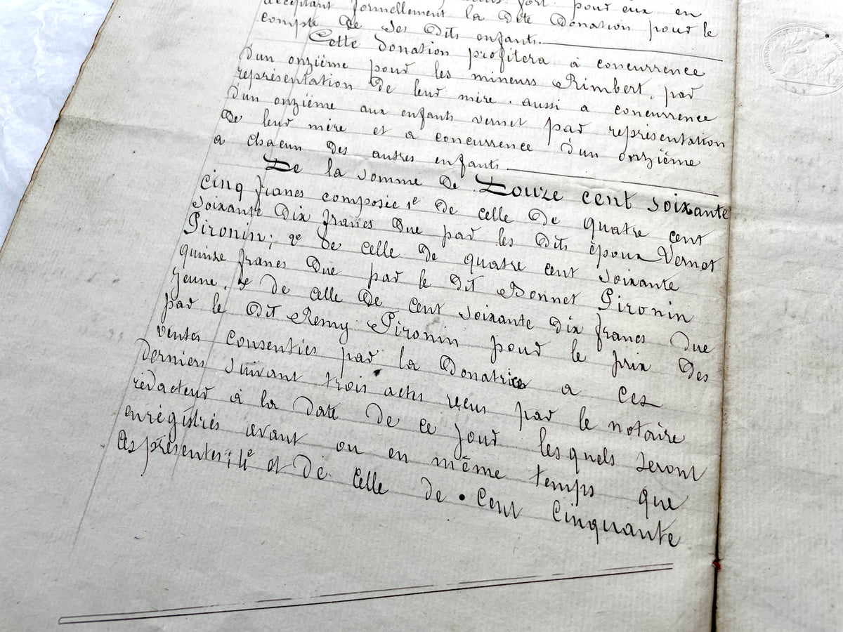 Late 19th Century French Notarial Act - Handwritten legal document with official stamps and elaborate script.