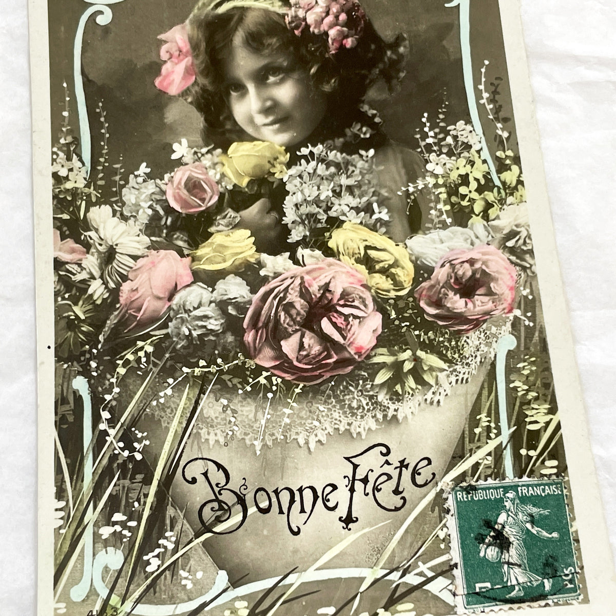 1910s - Vintage French Postcard - Little Girl With Flowers - Bonne Fete Greeting Card - Hand Tinted Sepia Photo Ephemera Collectible