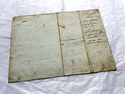 1810s French notarial act - detailed handwritten legal document with official stamps and elegant French script.