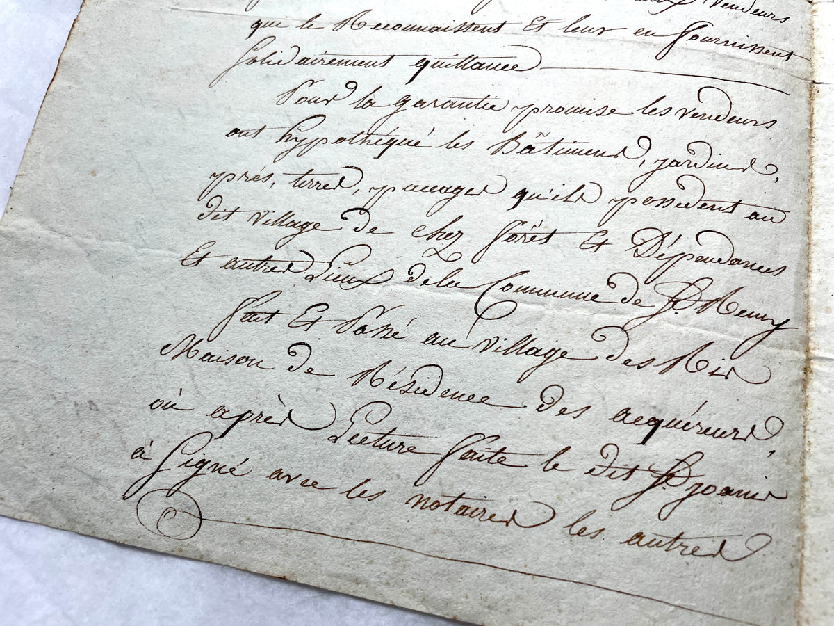 1810s French notarial act - detailed handwritten legal document with official stamps and elegant French script.
