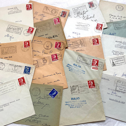 Batch of 20 French envelopes from the 1950s featuring various vintage stamps, postmarks, and handwritten addresses.