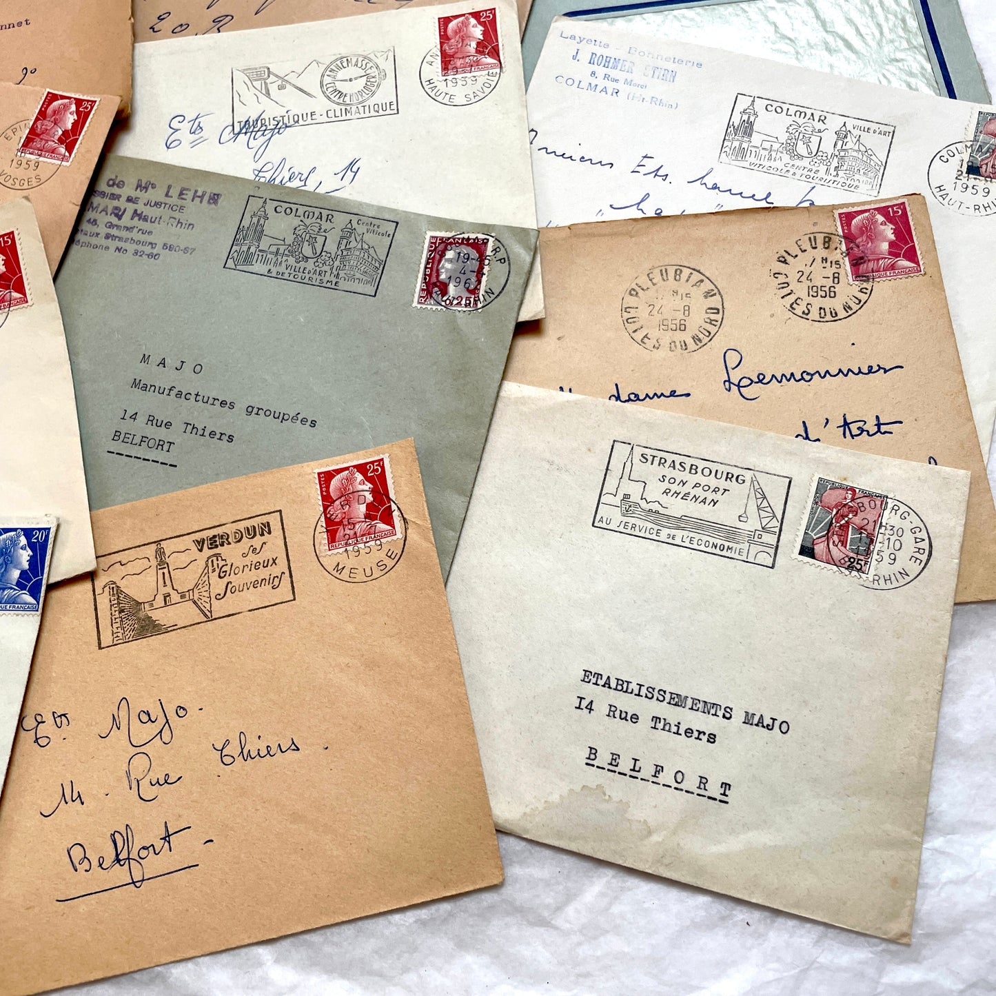 Lot of 20 French envelopes from the 1950s with various postmarks and postage stamps.