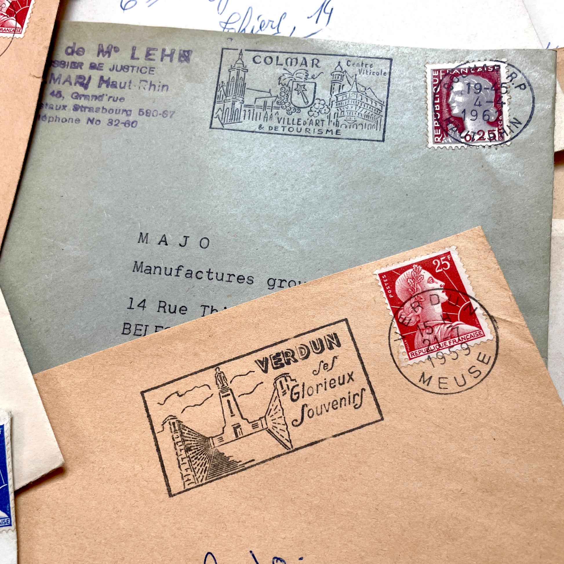 Lot of 20 French envelopes from the 1950s with various postmarks and postage stamps.