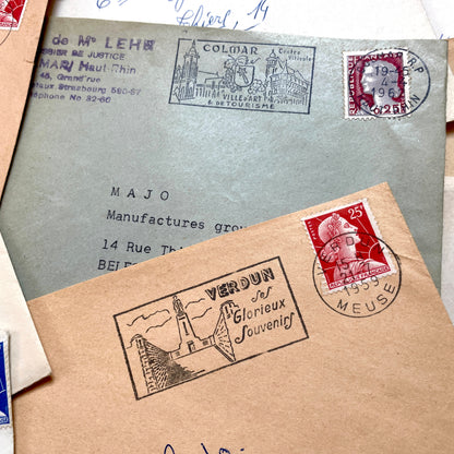 Lot of 20 French envelopes from the 1950s with various postmarks and postage stamps.