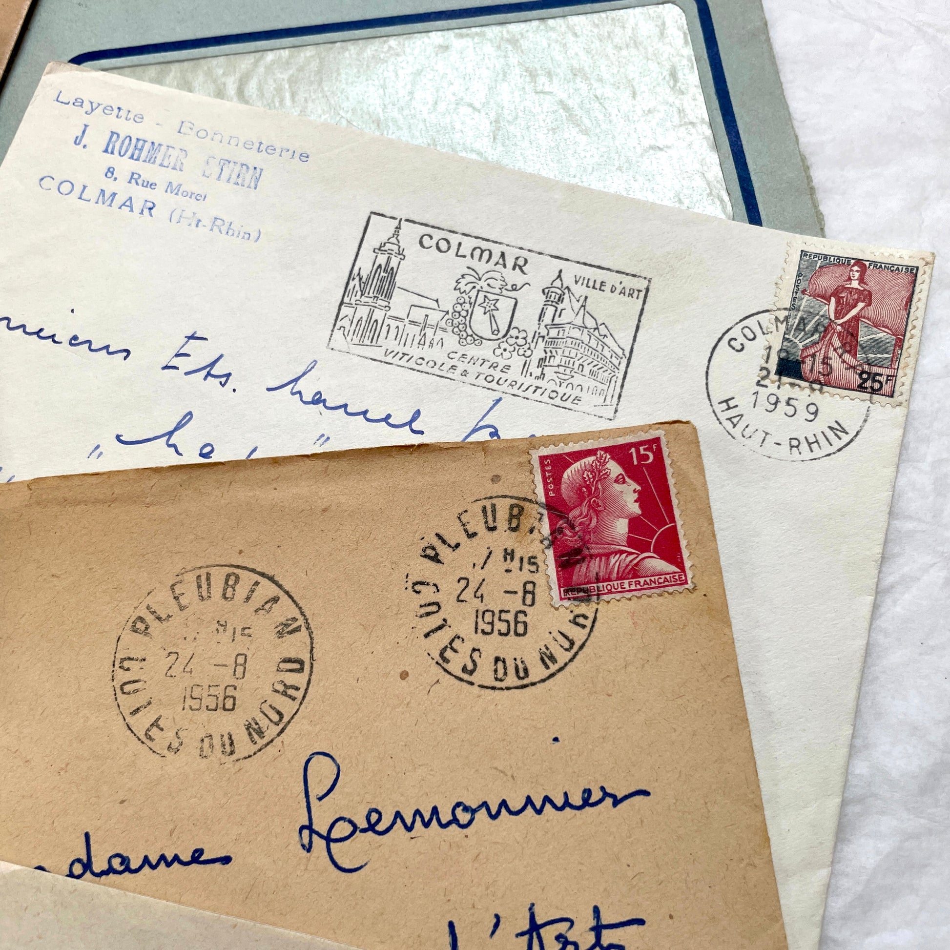 Lot of 20 French envelopes from the 1950s with various postmarks and postage stamps.
