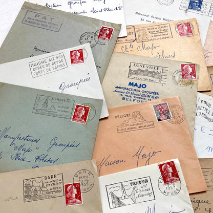 Lot of 20 vintage French envelopes from the 1950s, featuring various postmarks and stamps, ideal for collectors.