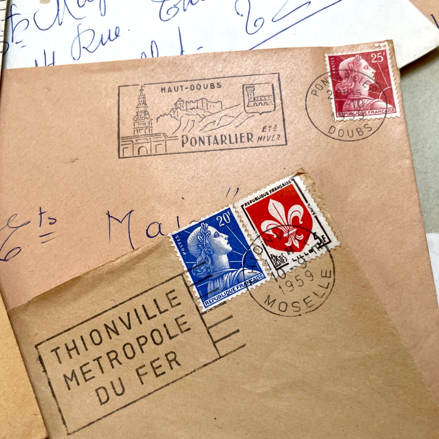 Lot of 20 vintage French envelopes from the 1950s, featuring various postmarks and stamps, ideal for collectors.