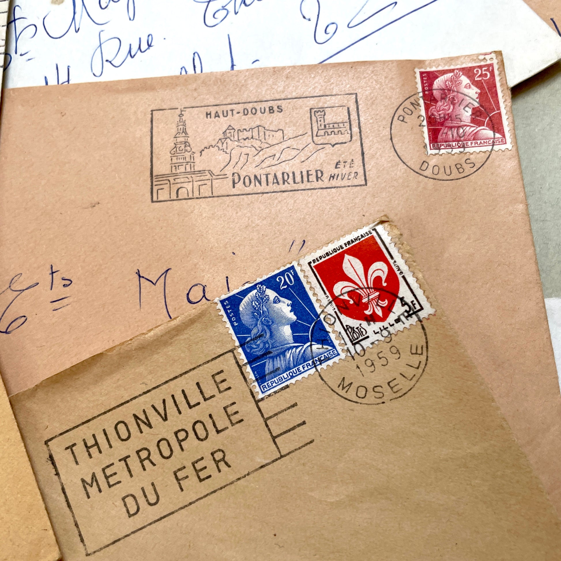 Lot of 20 vintage French envelopes from the 1950s, featuring various postmarks and stamps, ideal for collectors.