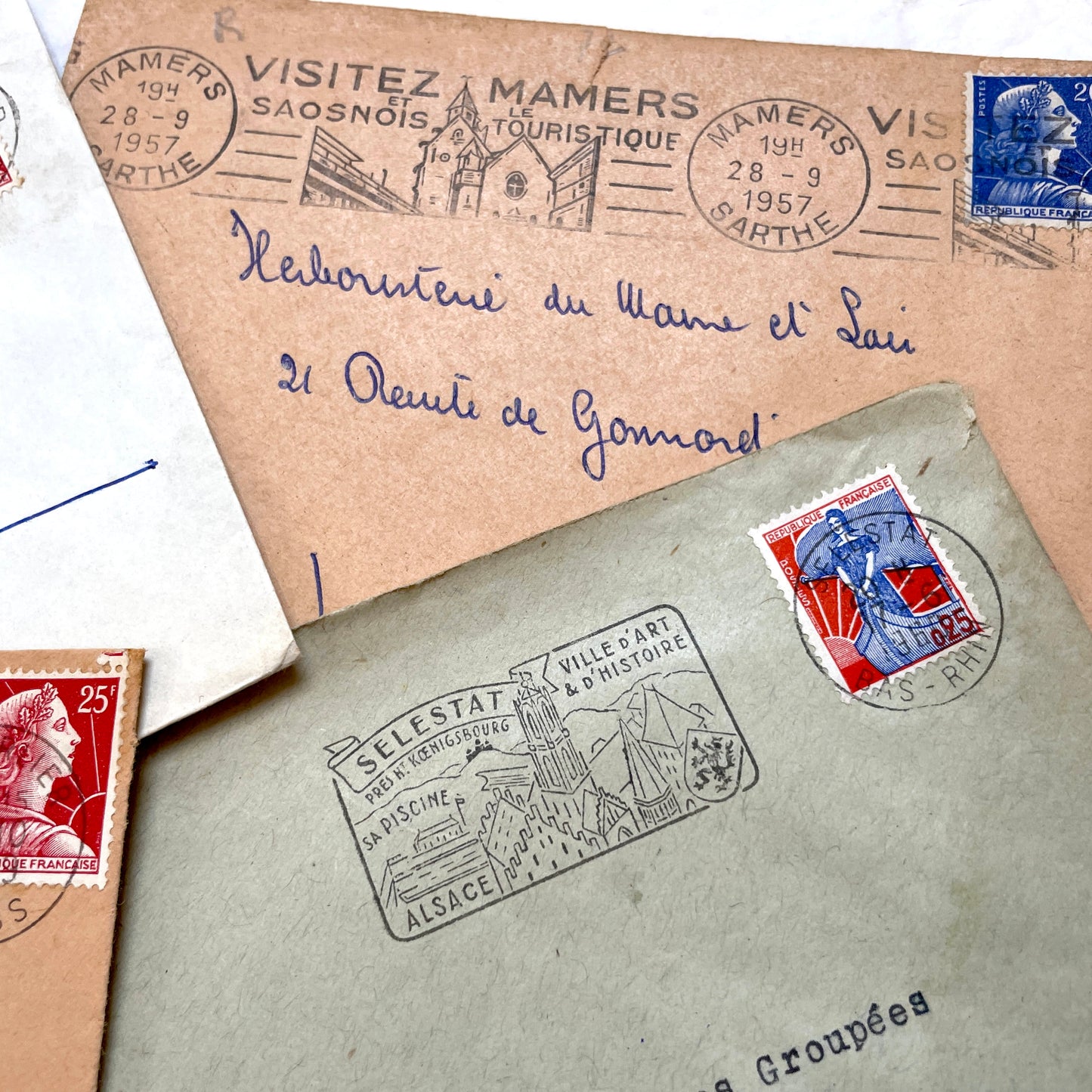 Lot of 20 vintage French envelopes from the 1950s, featuring various postmarks and stamps, ideal for collectors.