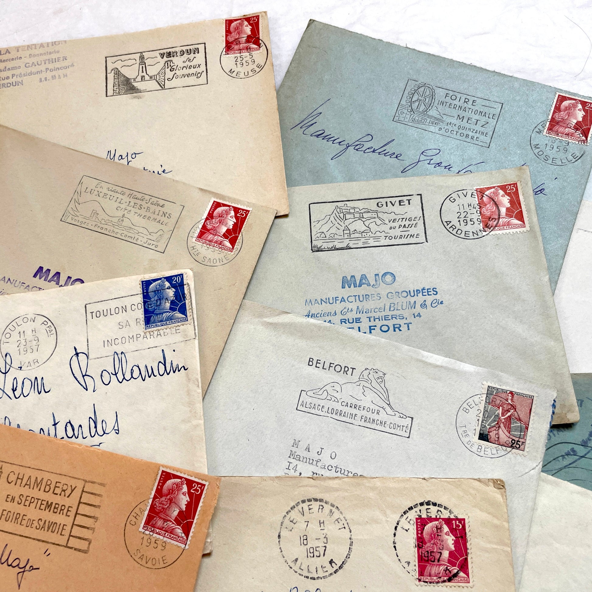 Lot of 20 French envelopes from the 1950s, featuring various postal stamps, handwritten addresses, and distinct postmarks.