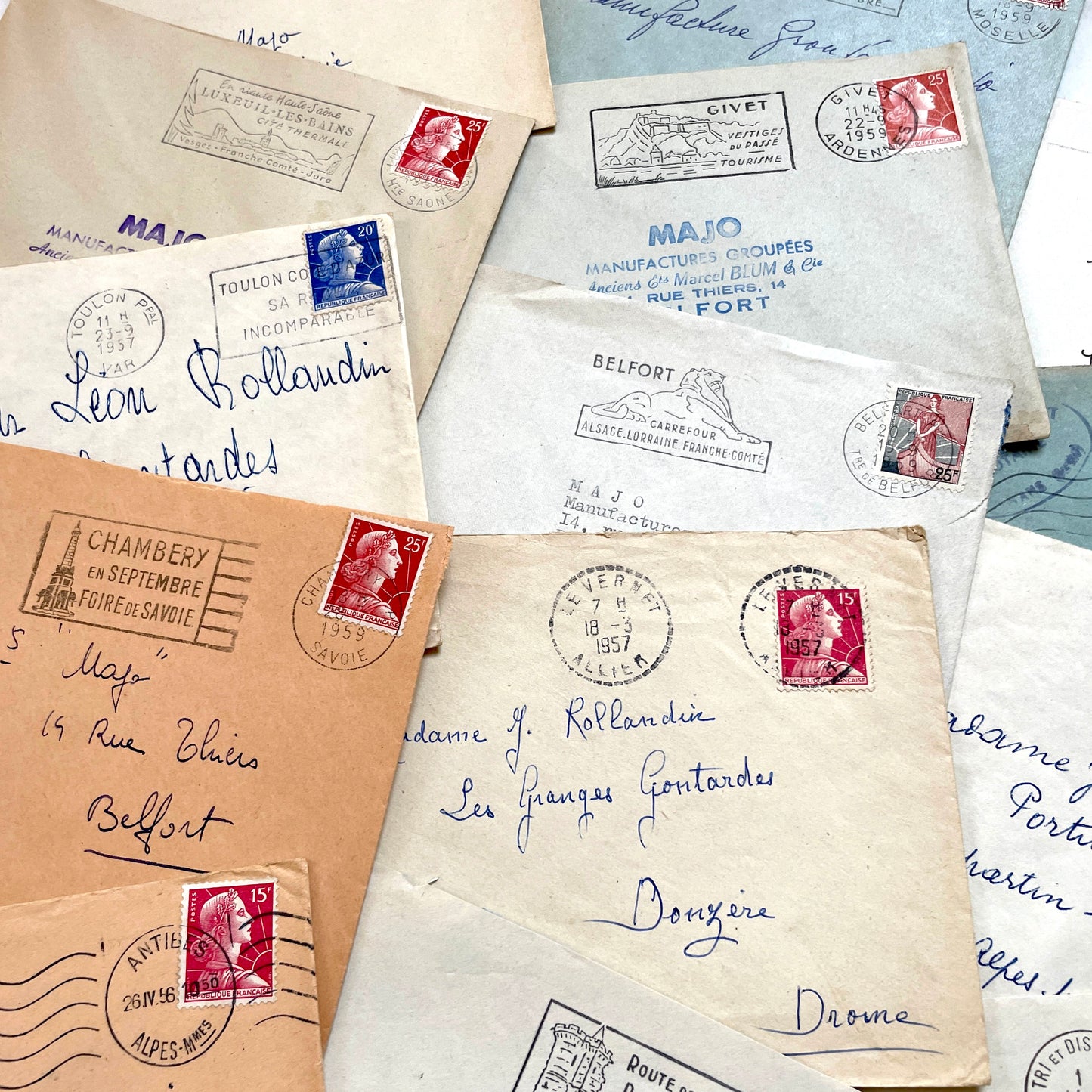 Lot of 20 French envelopes from the 1950s, featuring various postal stamps, handwritten addresses, and distinct postmarks.