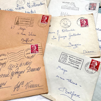 Lot of 20 French envelopes from the 1950s, featuring various postal stamps, handwritten addresses, and distinct postmarks.