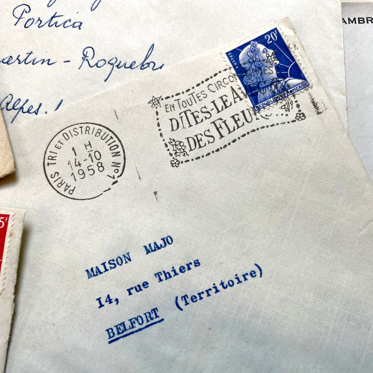 Lot of 20 French envelopes from the 1950s, featuring various postal stamps, handwritten addresses, and distinct postmarks.