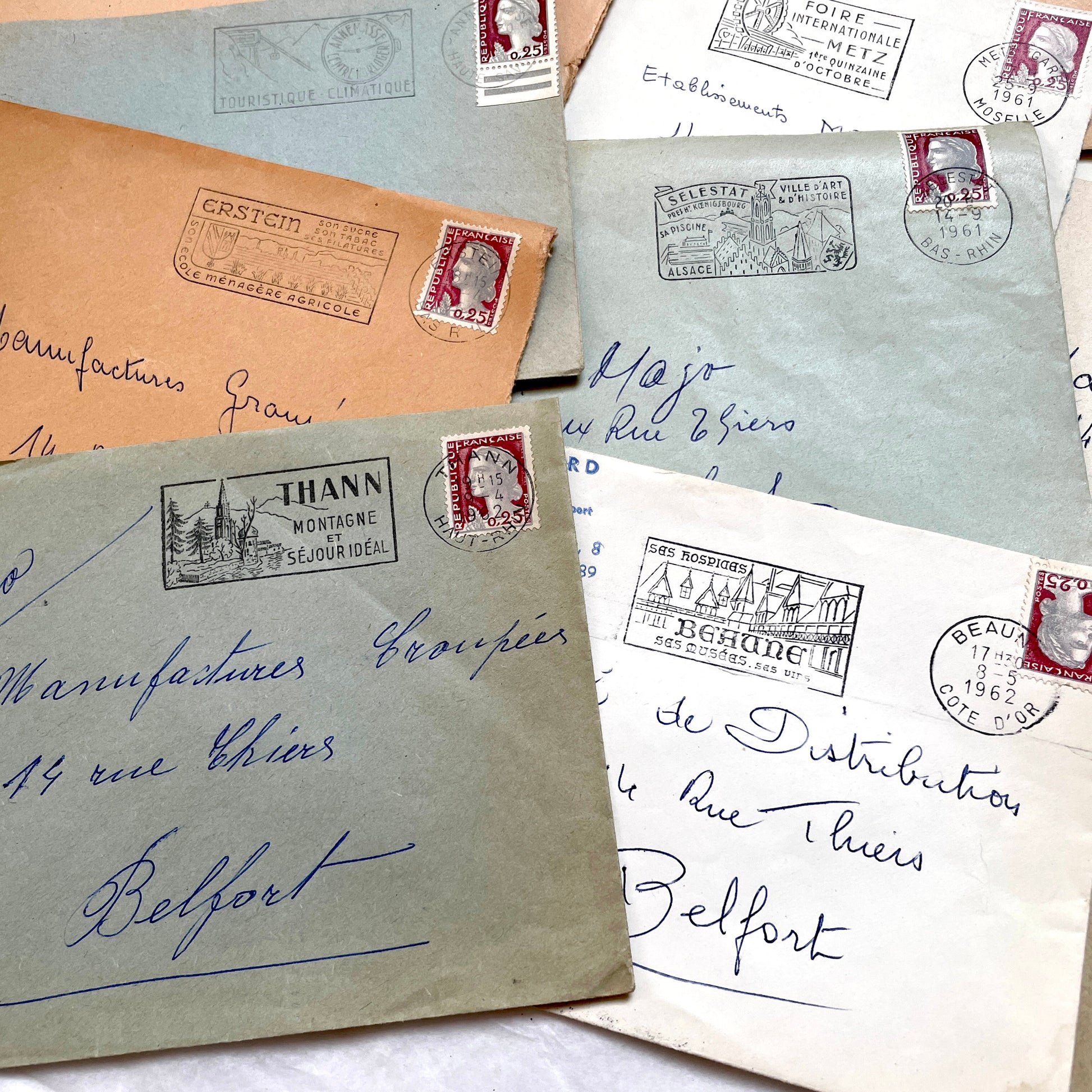 1960s French envelopes lot with vintage postmarks and Marianne stamps, showing diverse regional illustrations from France.