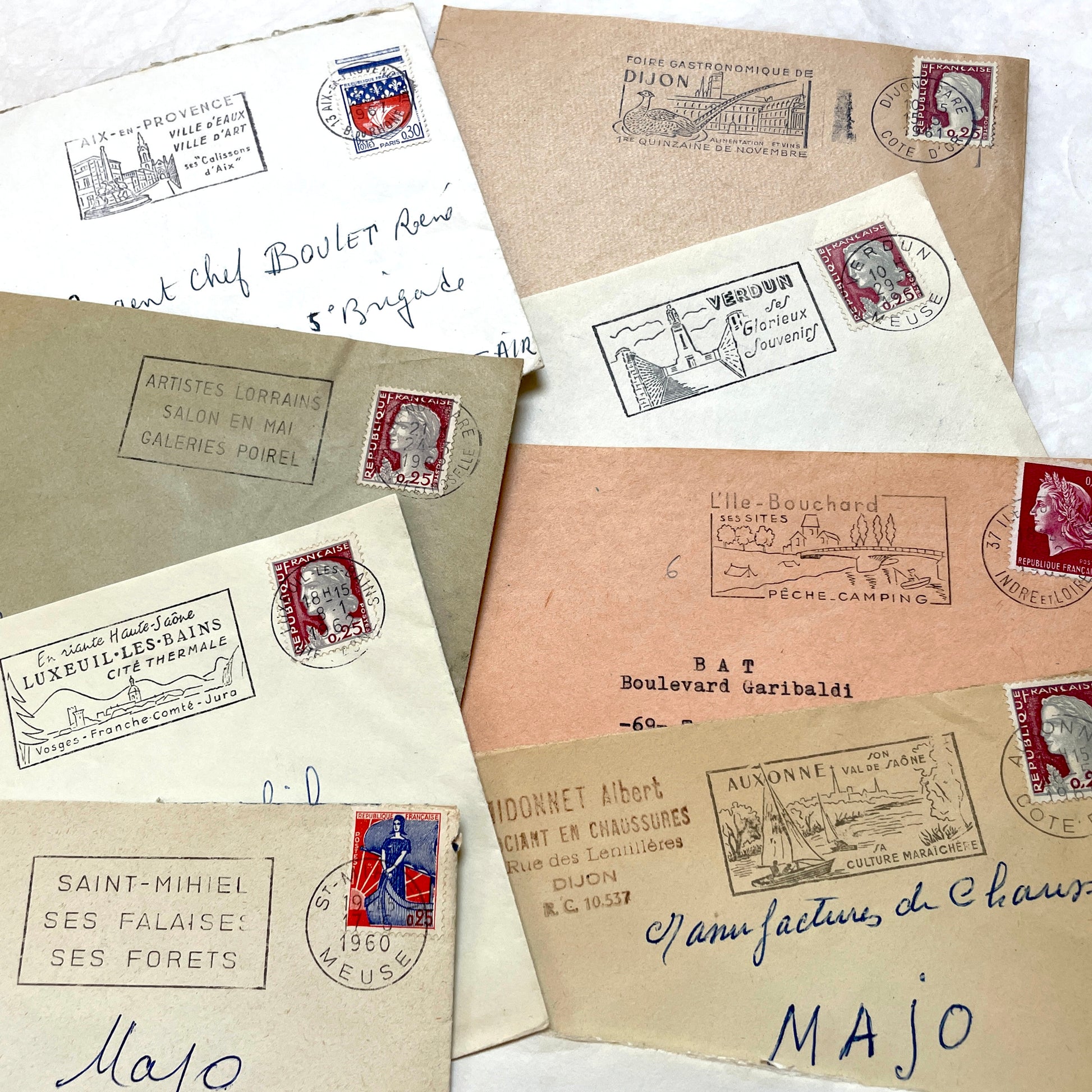 1960s French envelopes lot with vintage postmarks and Marianne stamps, showing diverse regional illustrations from France.