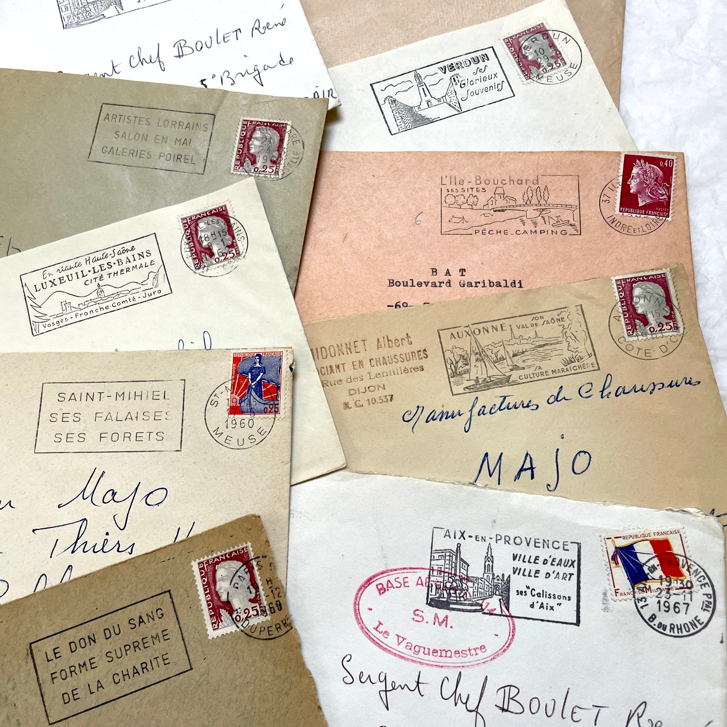 1960s French envelopes lot with vintage postmarks and Marianne stamps, showing diverse regional illustrations from France.
