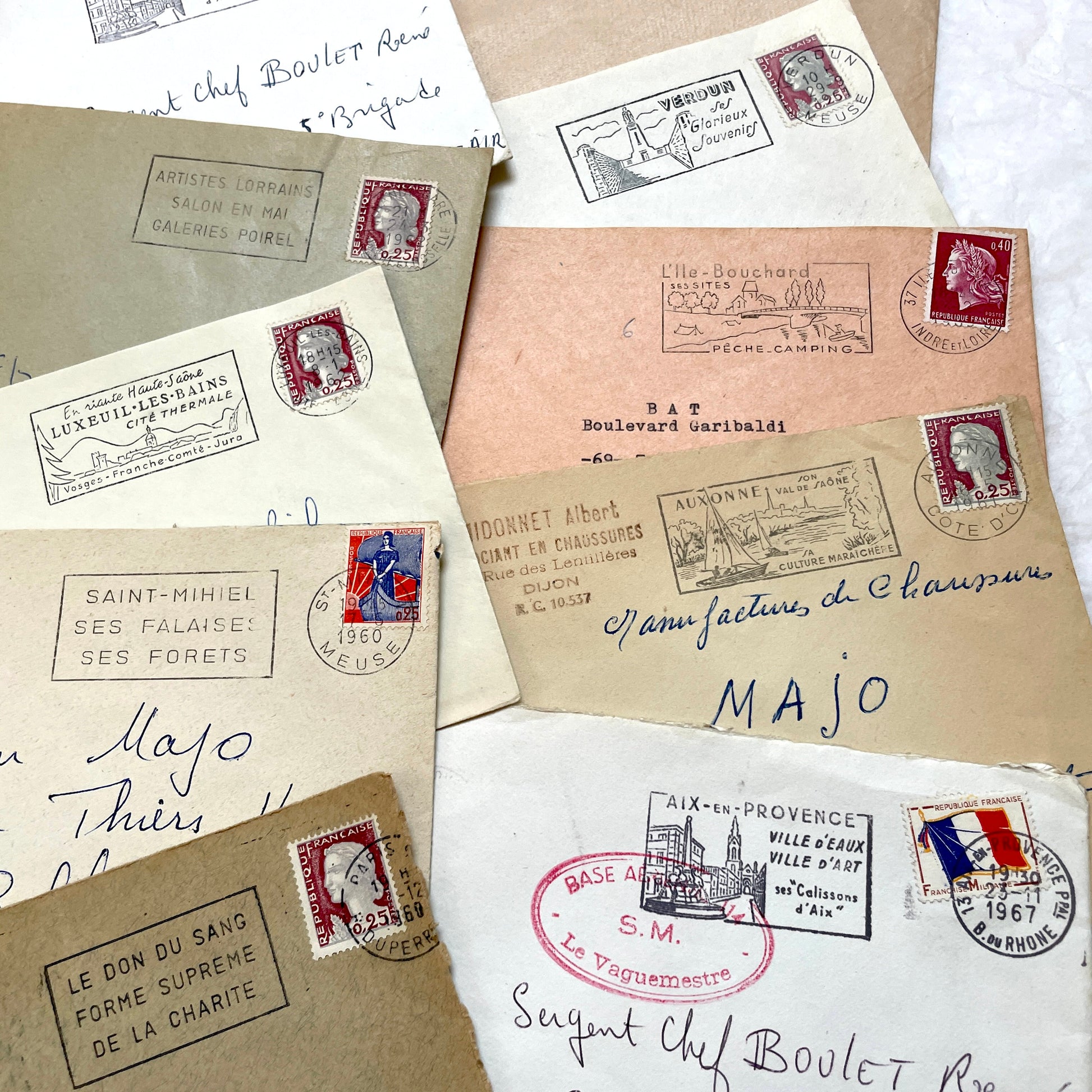 1960s French envelopes lot with vintage postmarks and Marianne stamps, showing diverse regional illustrations from France.