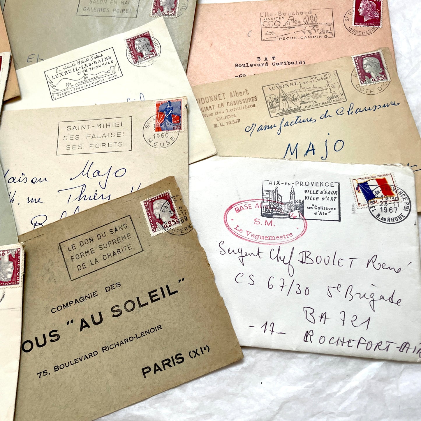 1960s French envelopes lot with vintage postmarks and Marianne stamps, showing diverse regional illustrations from France.