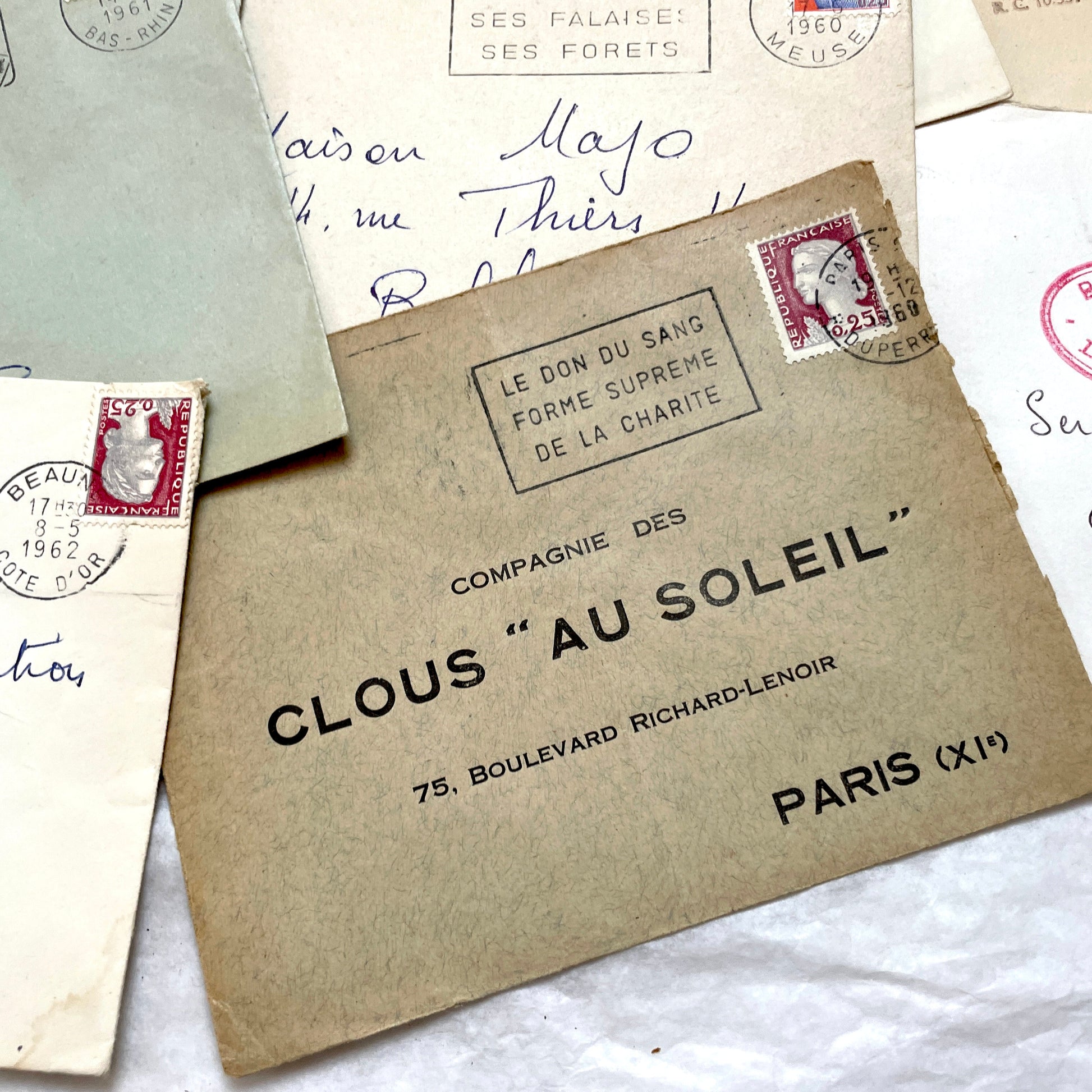 1960s French envelopes lot with vintage postmarks and Marianne stamps, showing diverse regional illustrations from France.