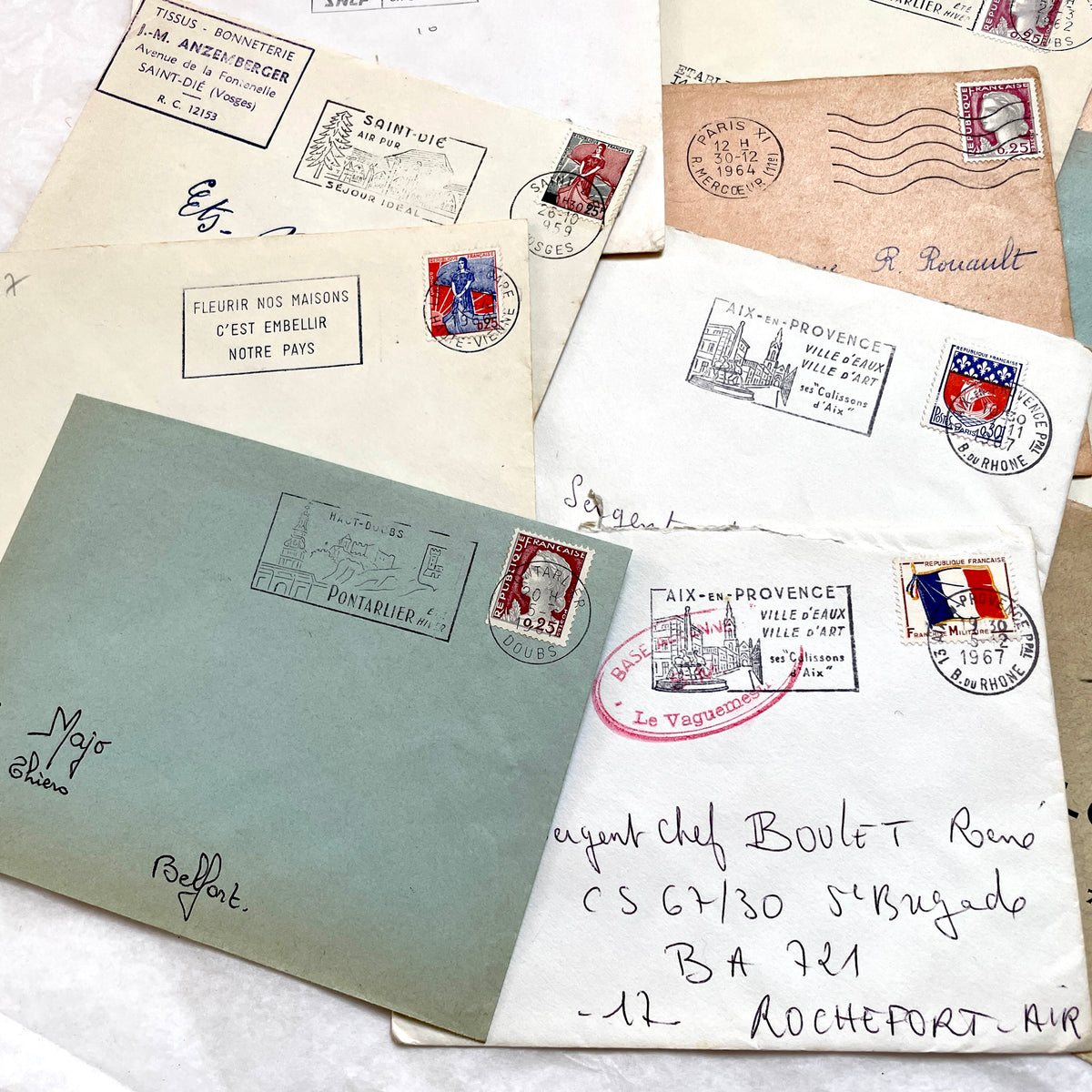 Lot of 20 vintage French envelopes from the 1960s, showcasing diverse stamps and postmarks from various French cities.