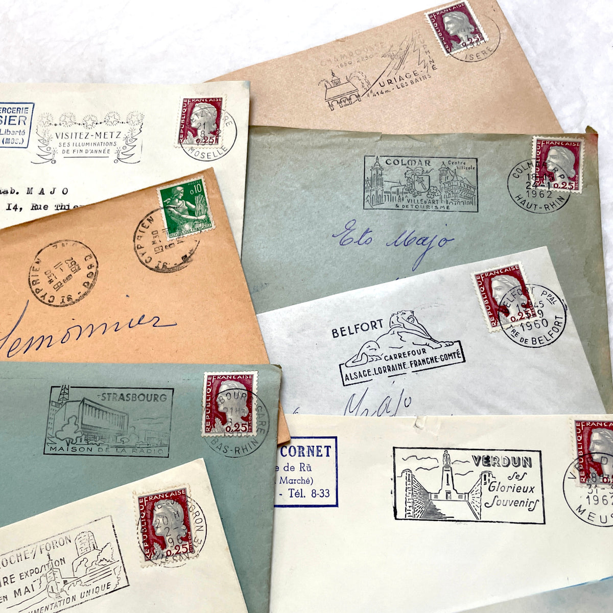 Lot of 20 vintage French envelopes from the 1960s, showcasing diverse stamps and postmarks from various French cities.