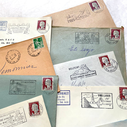 Lot of 20 vintage French envelopes from the 1960s, showcasing diverse stamps and postmarks from various French cities.