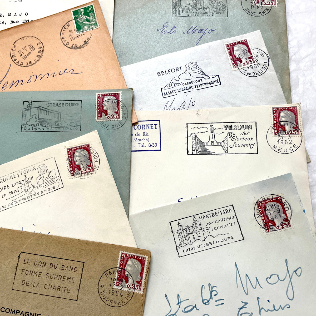 Lot of 20 vintage French envelopes from the 1960s, showcasing diverse stamps and postmarks from various French cities.