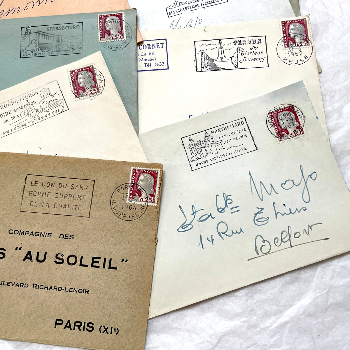 Lot of 20 vintage French envelopes from the 1960s, showcasing diverse stamps and postmarks from various French cities.