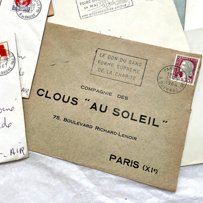 Lot of 20 vintage French envelopes from the 1960s, showcasing diverse stamps and postmarks from various French cities.