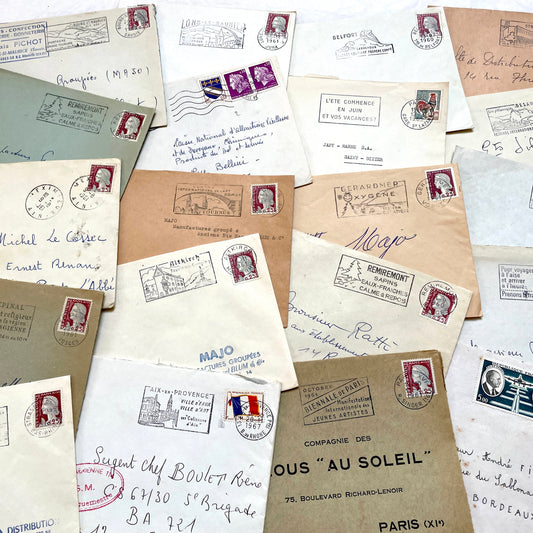 Lot of 20 1960s French envelopes with original stamps and diverse postmarks, showing various city letterheads.