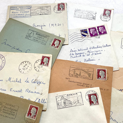 Lot of 20 1960s French envelopes with original stamps and diverse postmarks, showing various city letterheads.