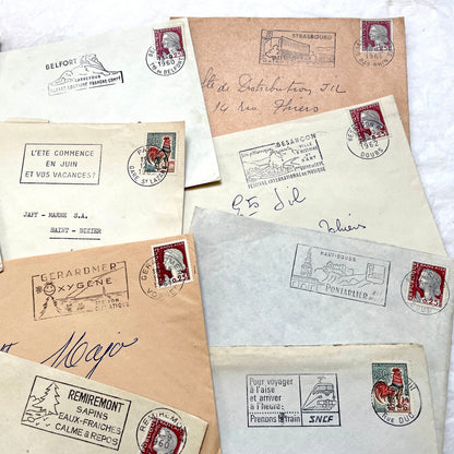 Lot of 20 1960s French envelopes with original stamps and diverse postmarks, showing various city letterheads.