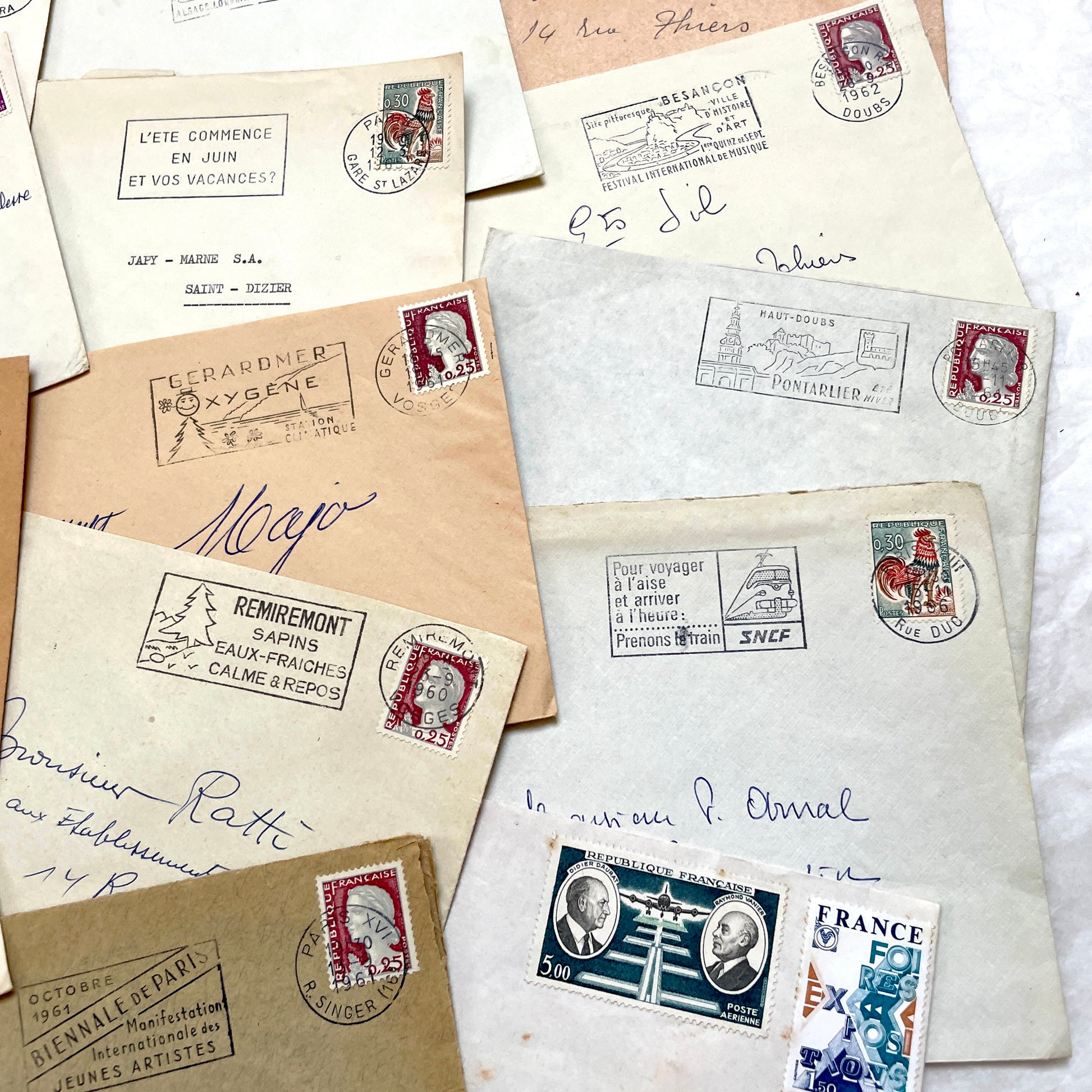 Lot of 20 1960s French envelopes with original stamps and diverse postmarks, showing various city letterheads.