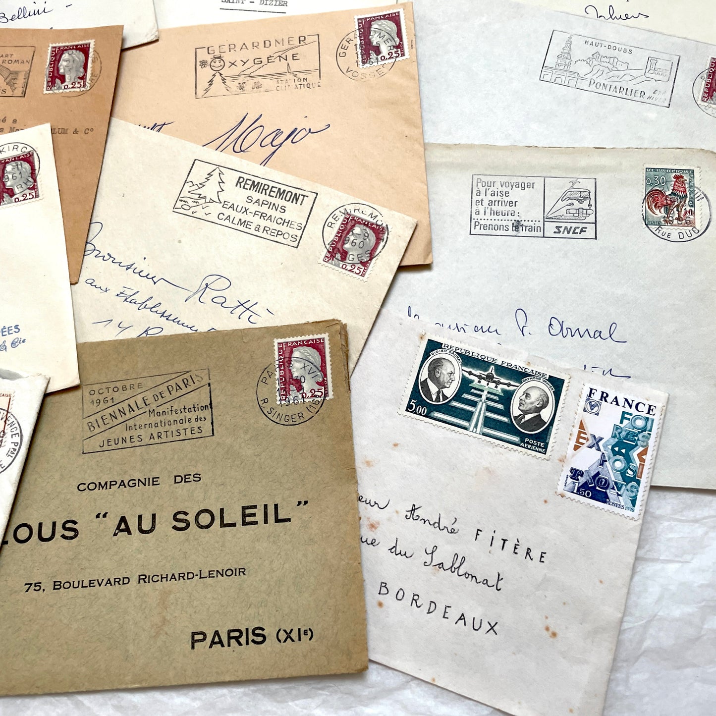 Lot of 20 1960s French envelopes with original stamps and diverse postmarks, showing various city letterheads.