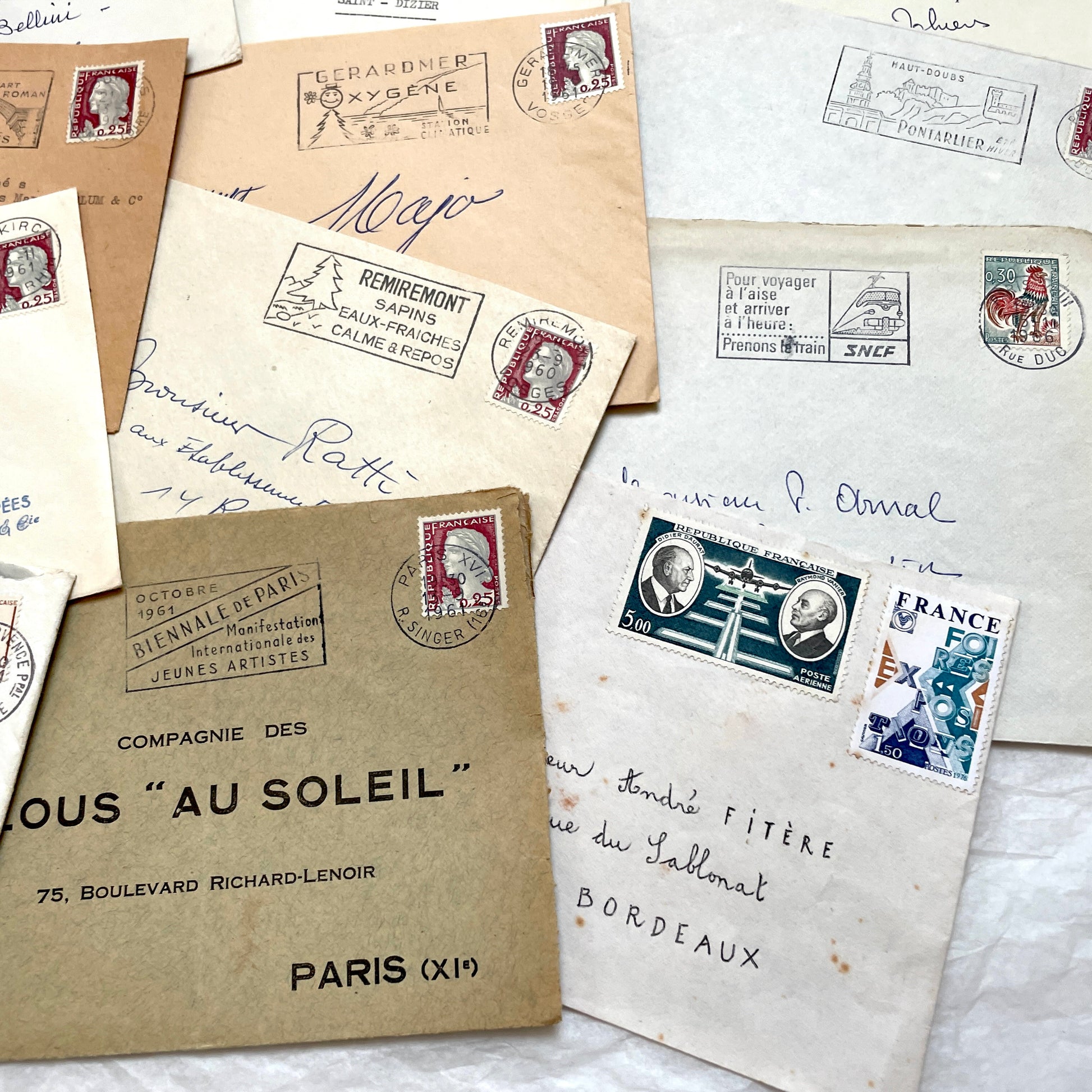 Lot of 20 1960s French envelopes with original stamps and diverse postmarks, showing various city letterheads.