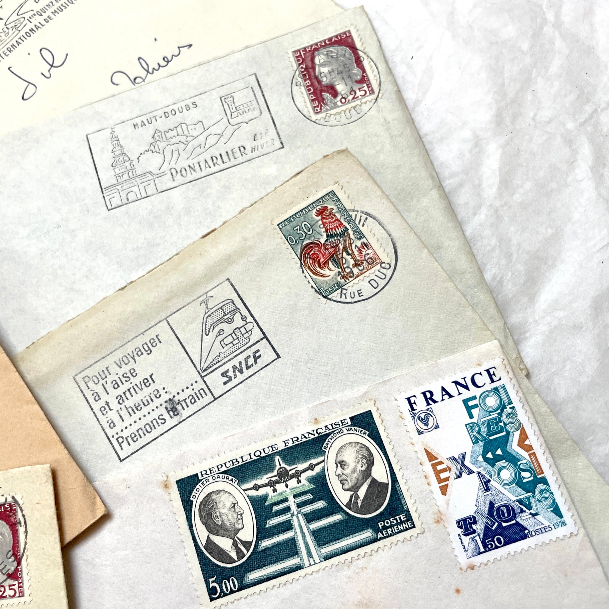 Lot of 20 1960s French envelopes with original stamps and diverse postmarks, showing various city letterheads.
