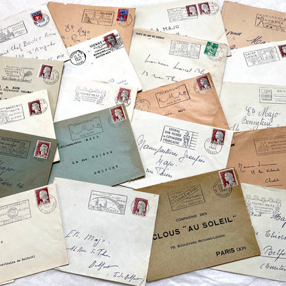 A batch of 20 vintage 1960s French envelopes featuring assorted postmarks, handwritten addresses, and Republic Française stam