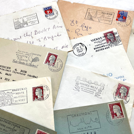 A batch of 20 vintage 1960s French envelopes featuring assorted postmarks, handwritten addresses, and Republic Française stam